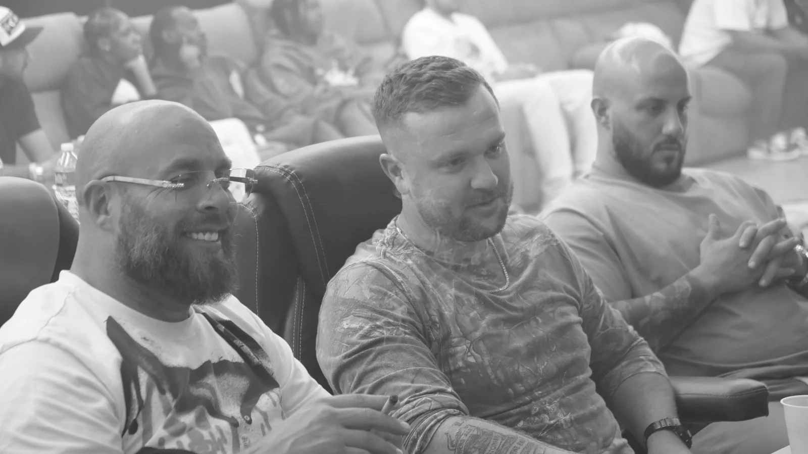 Luc Carlin (LMC): black-and-white photograph seated among attendees