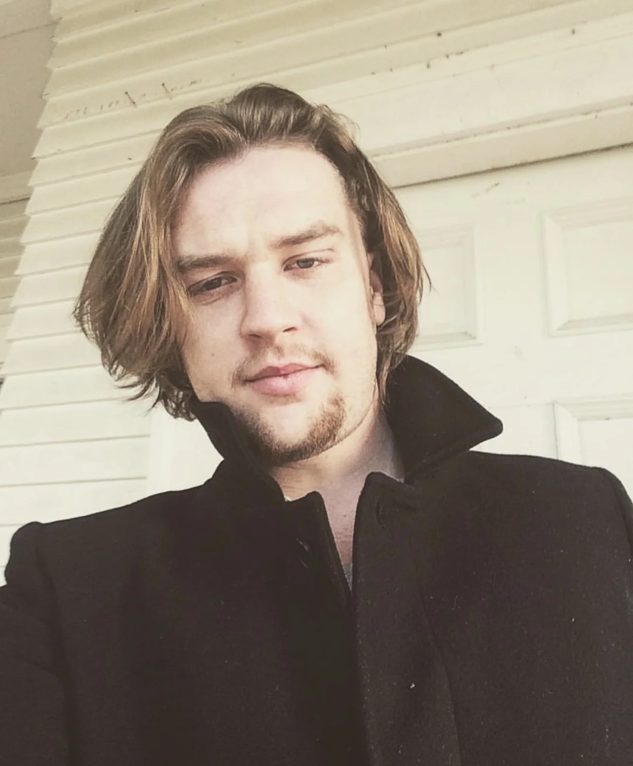 Luc Carlin (LMC): close-up portrait wearing a dark jacket