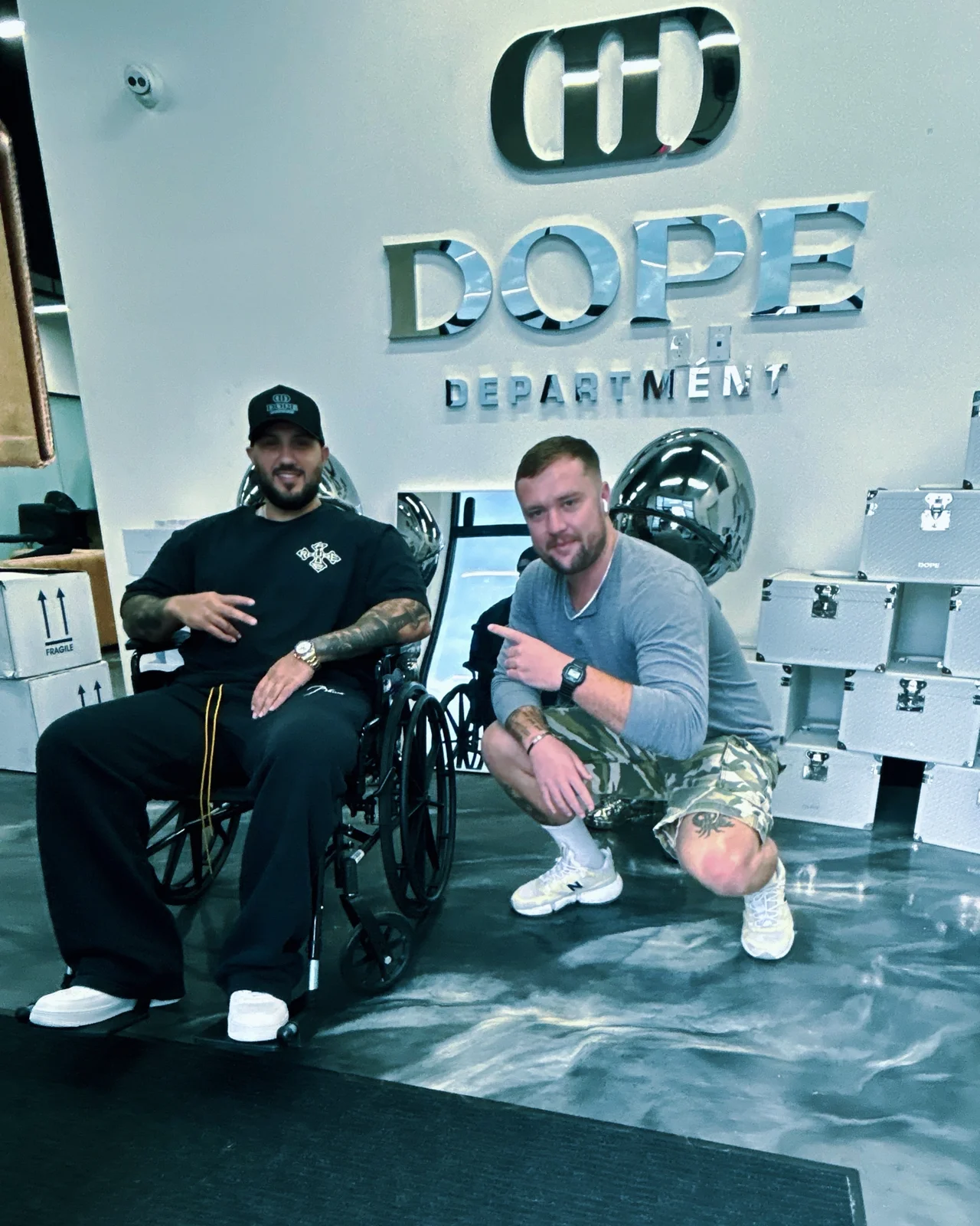Luc Carlin (LMC): crouching beside a guest at the dope department display